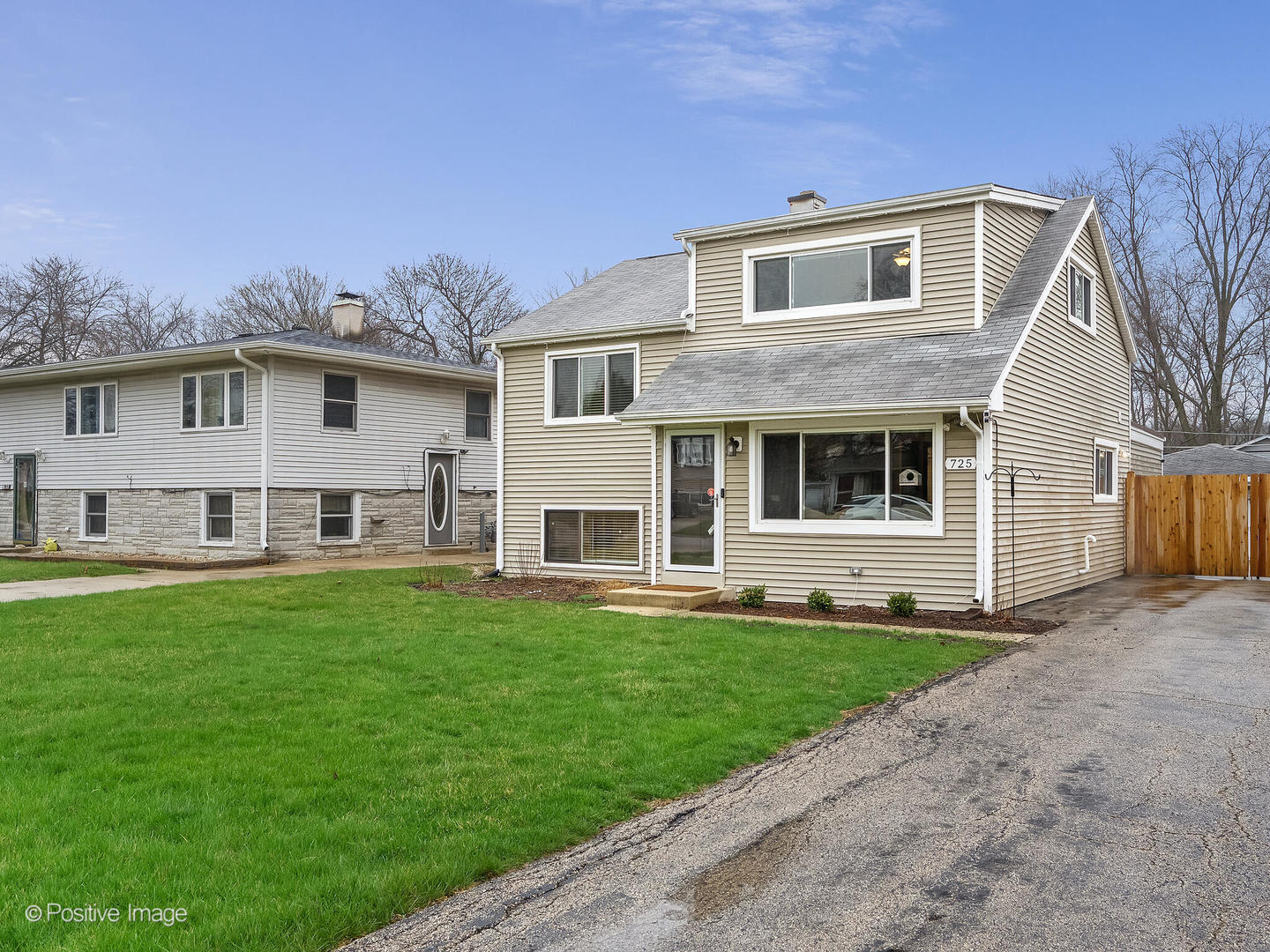 S725 East Street Winfield, IL 60190 - Photo 2 of 2 a front view of a house with a yard