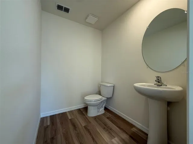 a bathroom with a sink and a toilet
