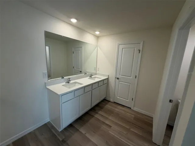 a view of utility room with a sink