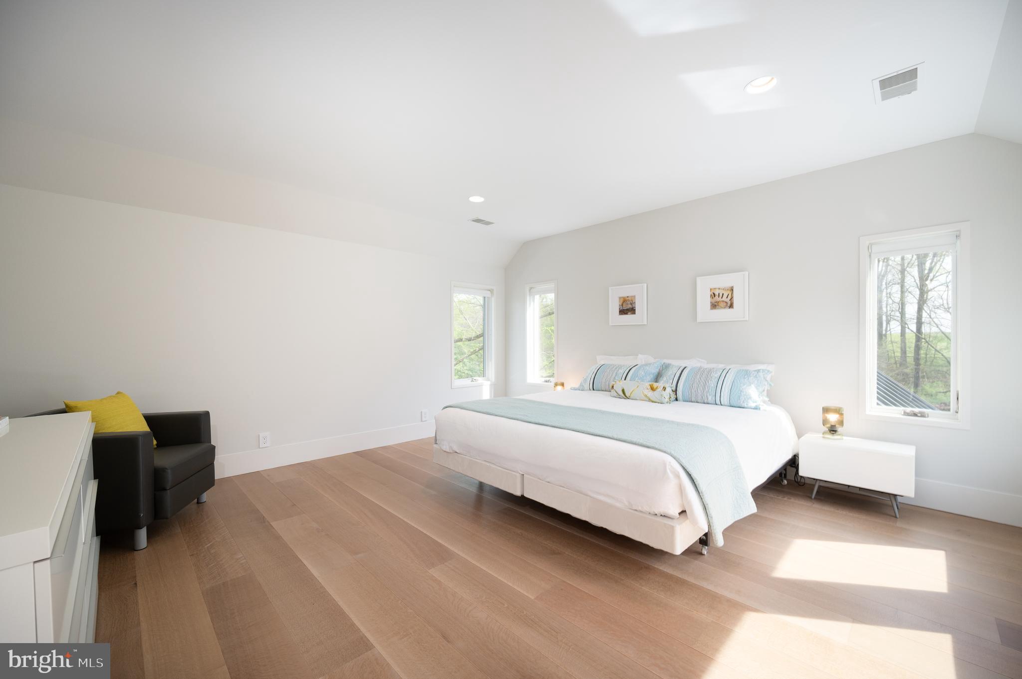 1205 Scott Road Kennett Square, PA 19348 - Photo 30 of 60 a bedroom with a bed and wooden floor