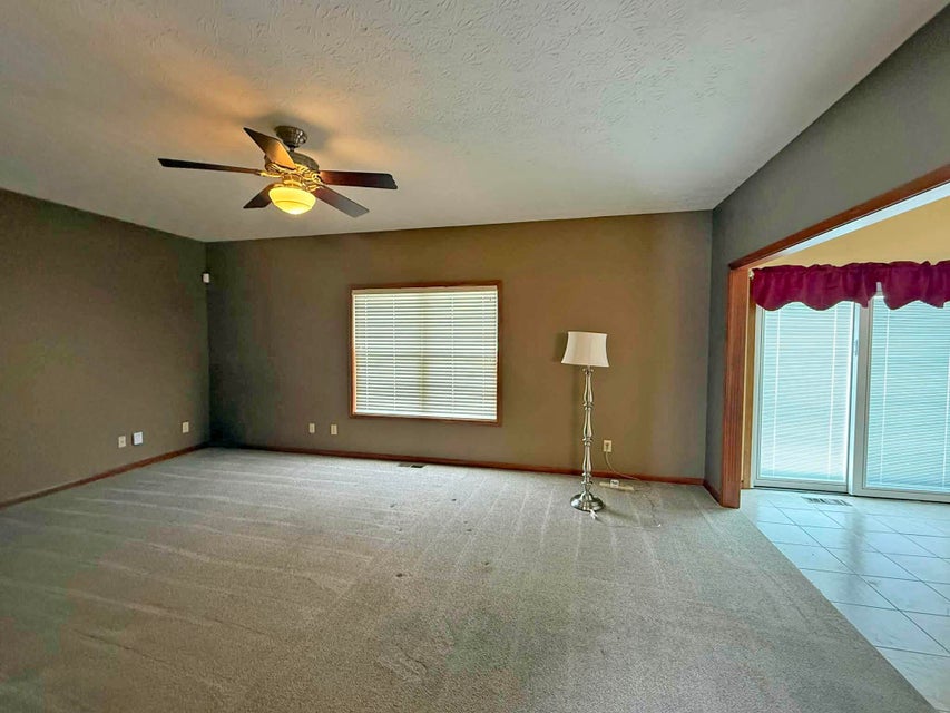 541 North Point Troy, OH 45373 - Photo 7 of 23 This inviting space offers comfort and ample natural light, ready for your personal touch.