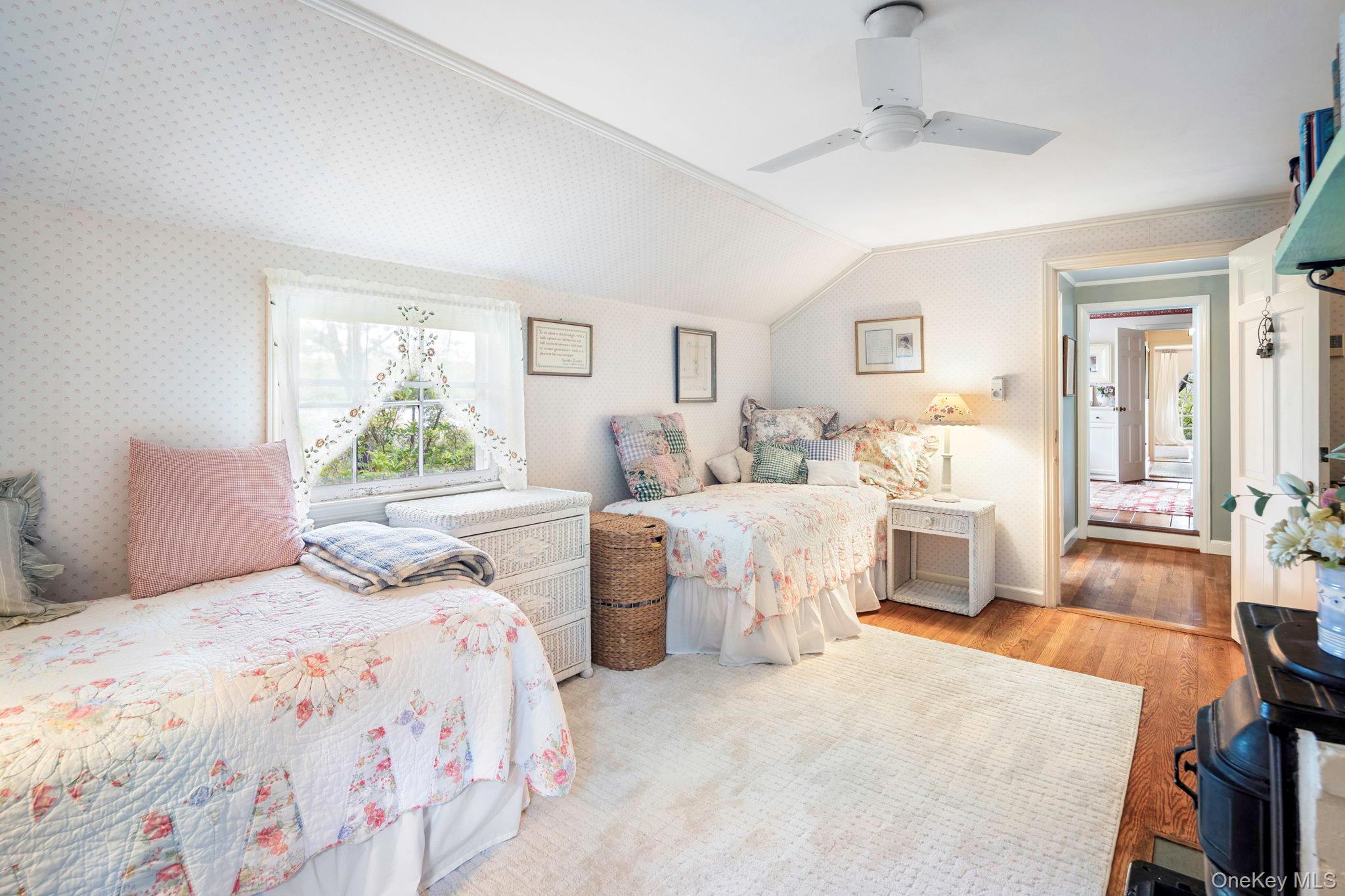 93 Cross Pond Road Pound Ridge, NY 10576 - Photo 24 of 44 a bedroom with a bed and a couch