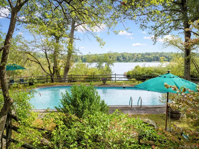 a view of a lake with a big yard