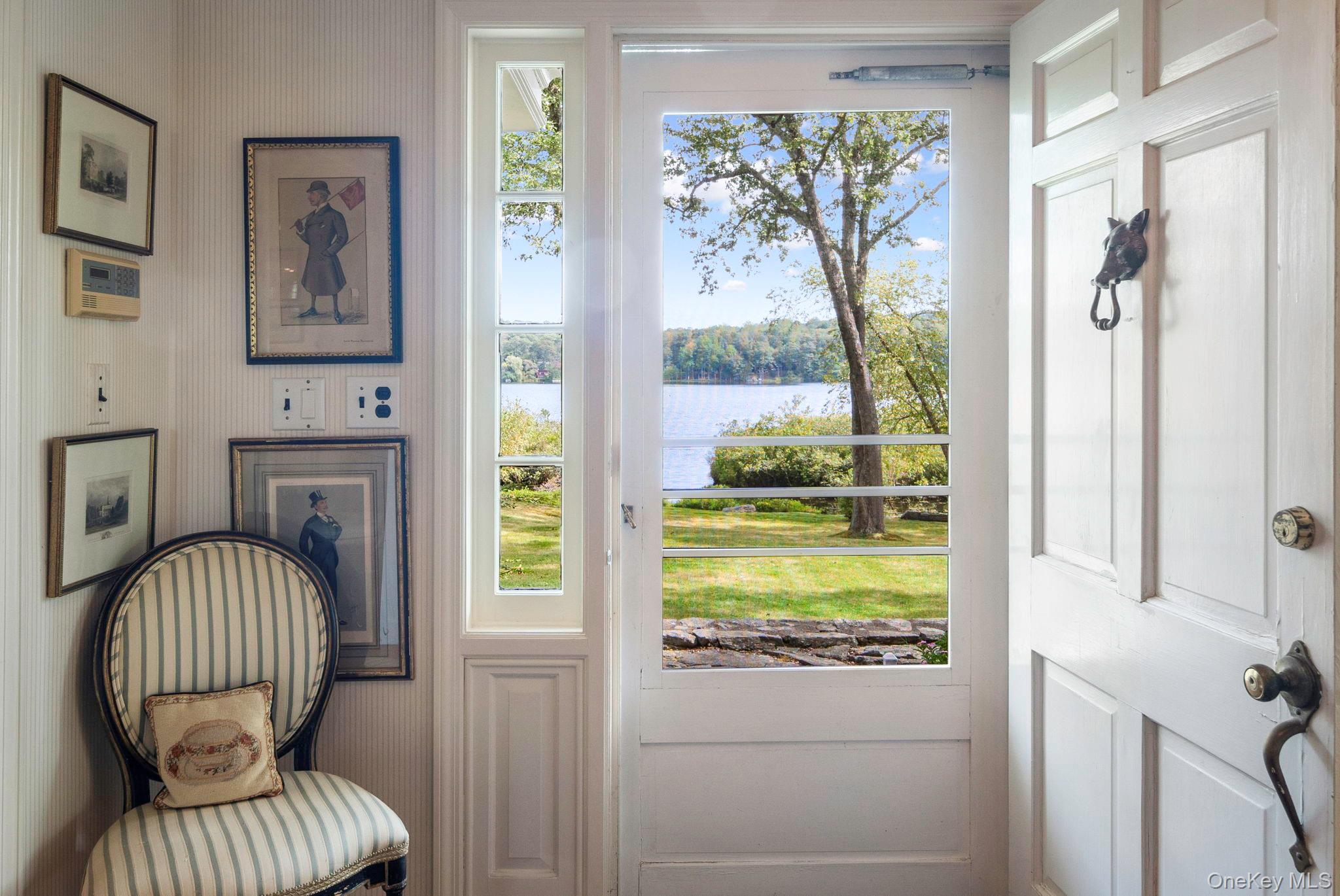 93 Cross Pond Road Pound Ridge, NY 10576 - Photo 8 of 44 a living room with furniture and a window