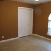 2109 Meadow Lane Grand Prairie, TX 75050 - Photo 13 of 17 an empty room with a window