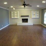 2109 Meadow Lane Grand Prairie, TX 75050 - Photo 3 of 17 an empty room with windows