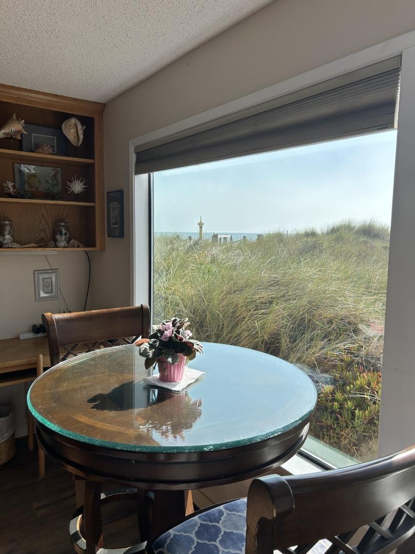 101 Shell Road, Unit 106 Watsonville, CA 95076 - Photo 6 of 9 a dining room with table and chairs