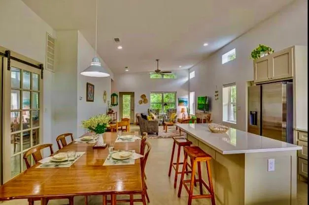 a view of a dining room with furniture window and outside view