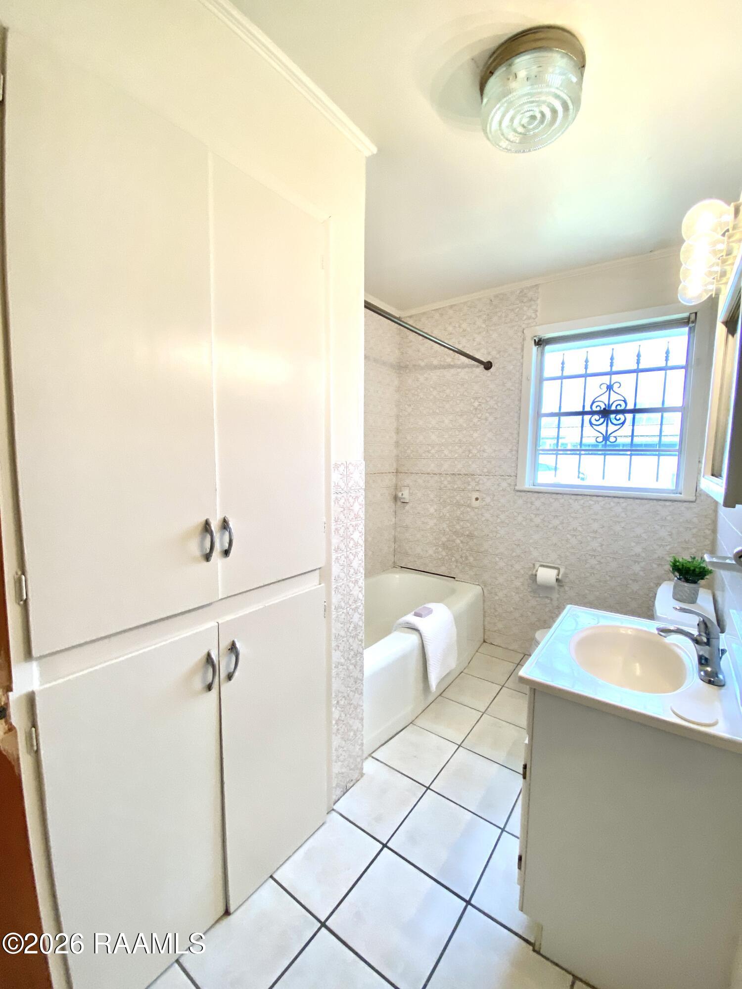801 2nd, Unit A Rayne, LA 70578 - Photo 11 of 15 Bathroom storage