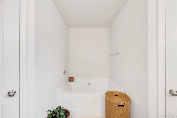 a bathroom with a bath tub
