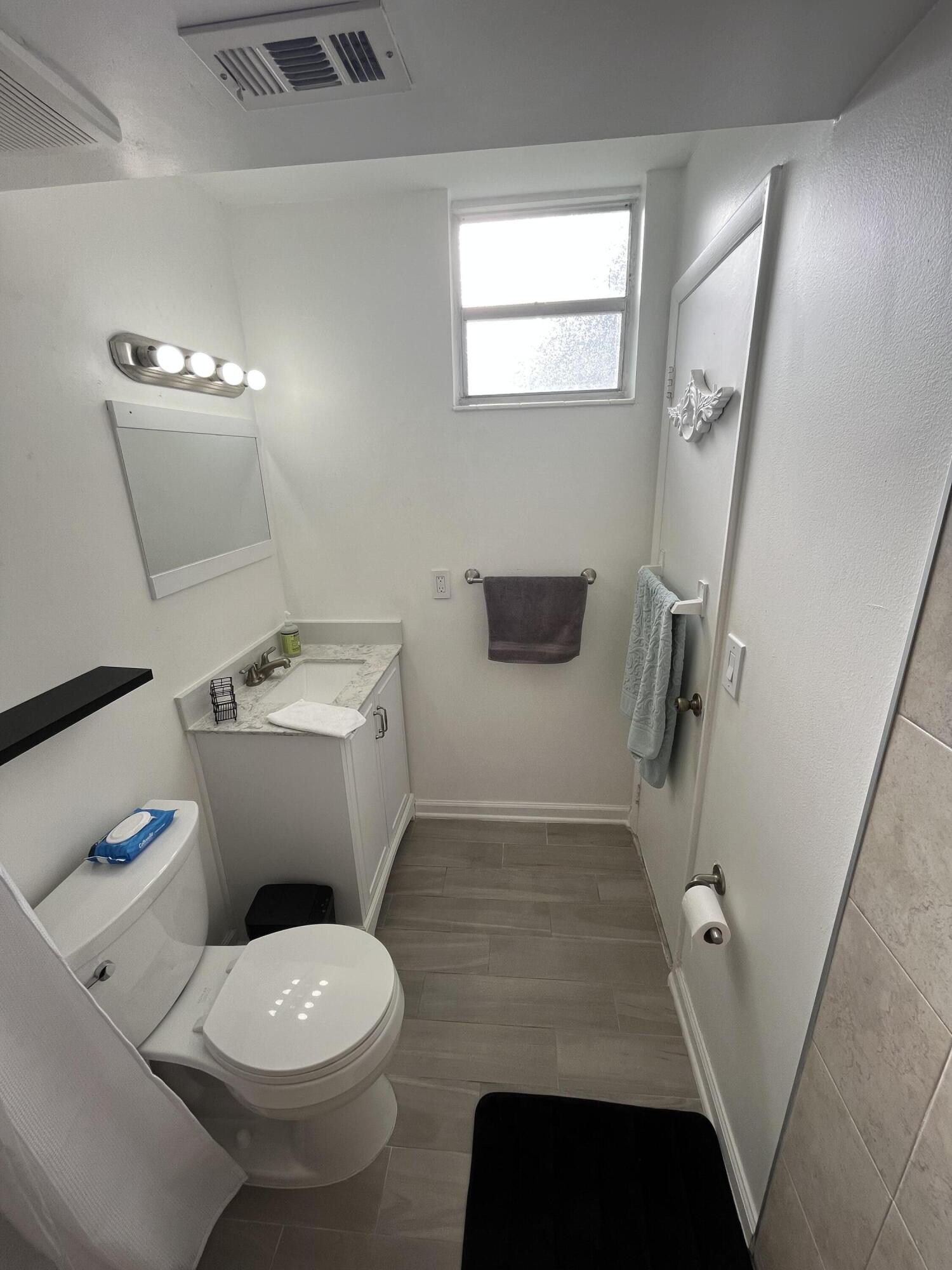 5961 Northwest 2nd Avenue, Unit 108 Boca Raton, FL 33487 - Photo 16 of 25 5961 master bathroom 1