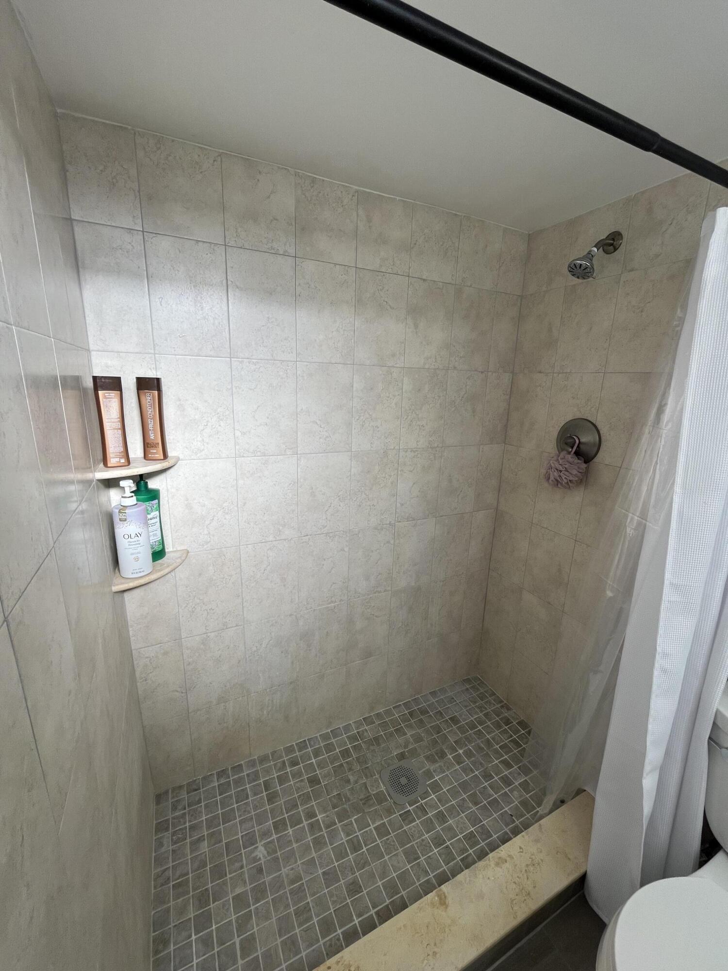 5961 Northwest 2nd Avenue, Unit 108 Boca Raton, FL 33487 - Photo 19 of 25 5961 2nd bathroom shower