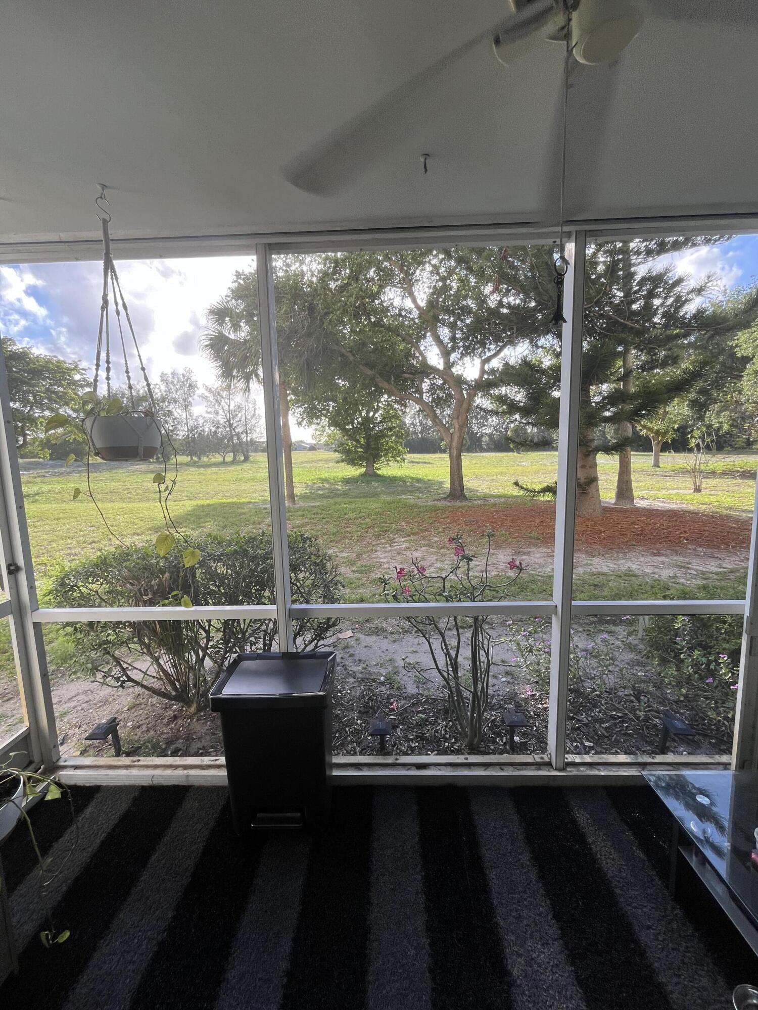 5961 Northwest 2nd Avenue, Unit 108 Boca Raton, FL 33487 - Photo 23 of 25 5961 back porch 2