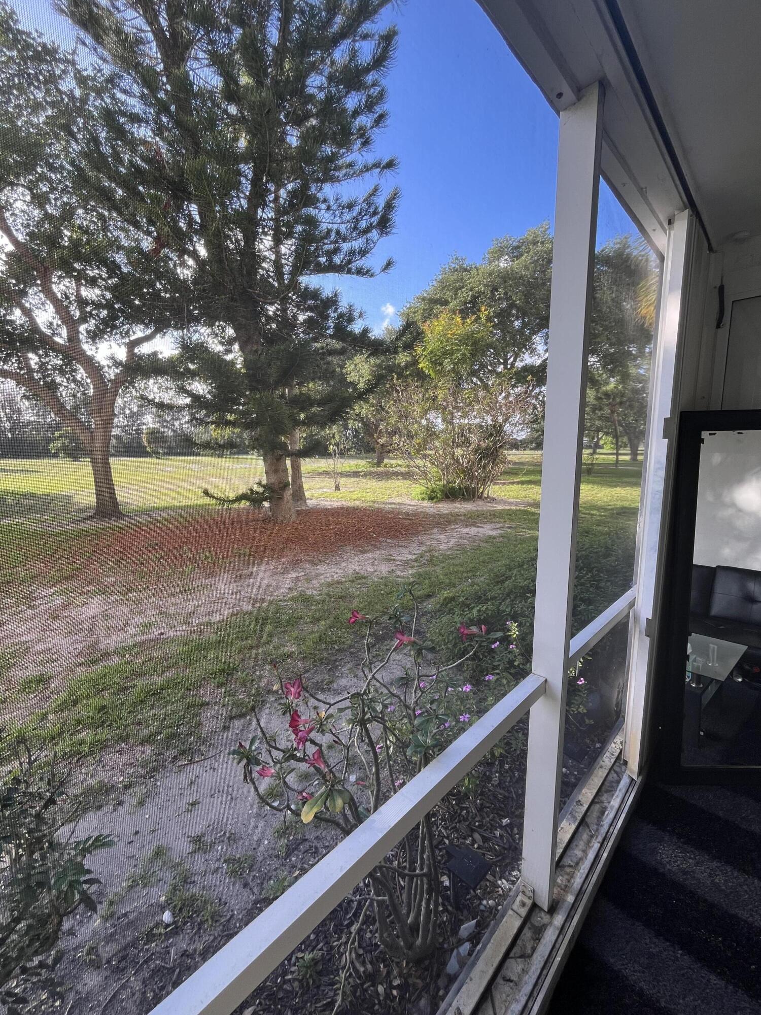 5961 Northwest 2nd Avenue, Unit 108 Boca Raton, FL 33487 - Photo 26 of 28 5961 golf course 1