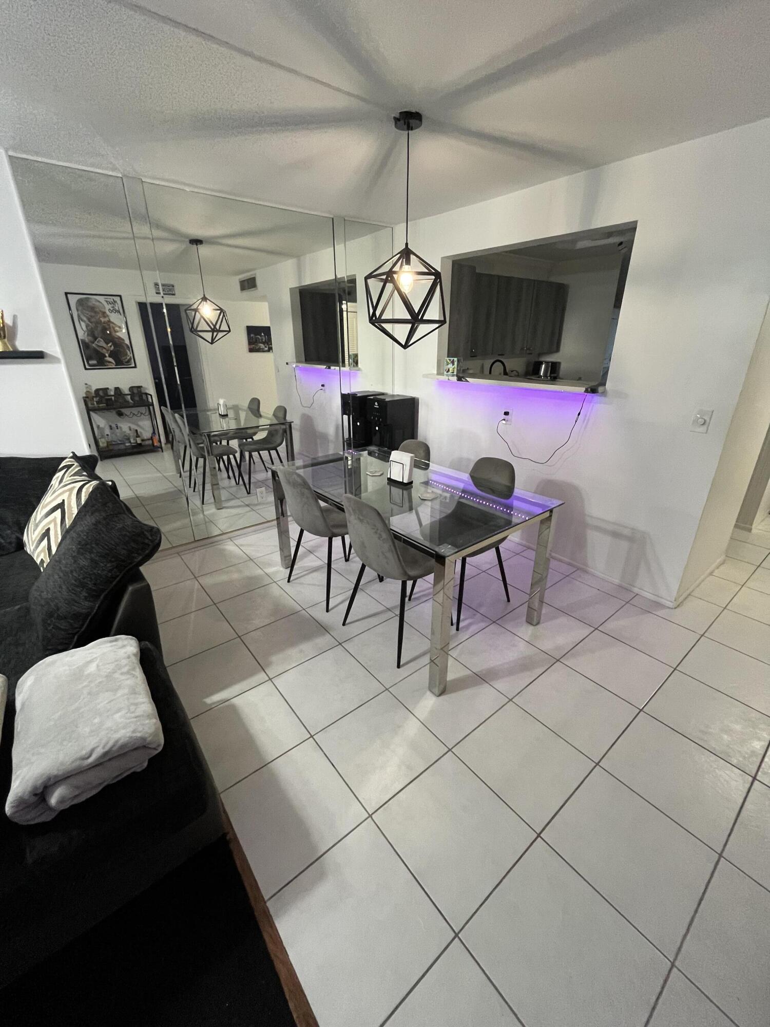 5961 Northwest 2nd Avenue, Unit 108 Boca Raton, FL 33487 - Photo 5 of 25 5961 dining area 2