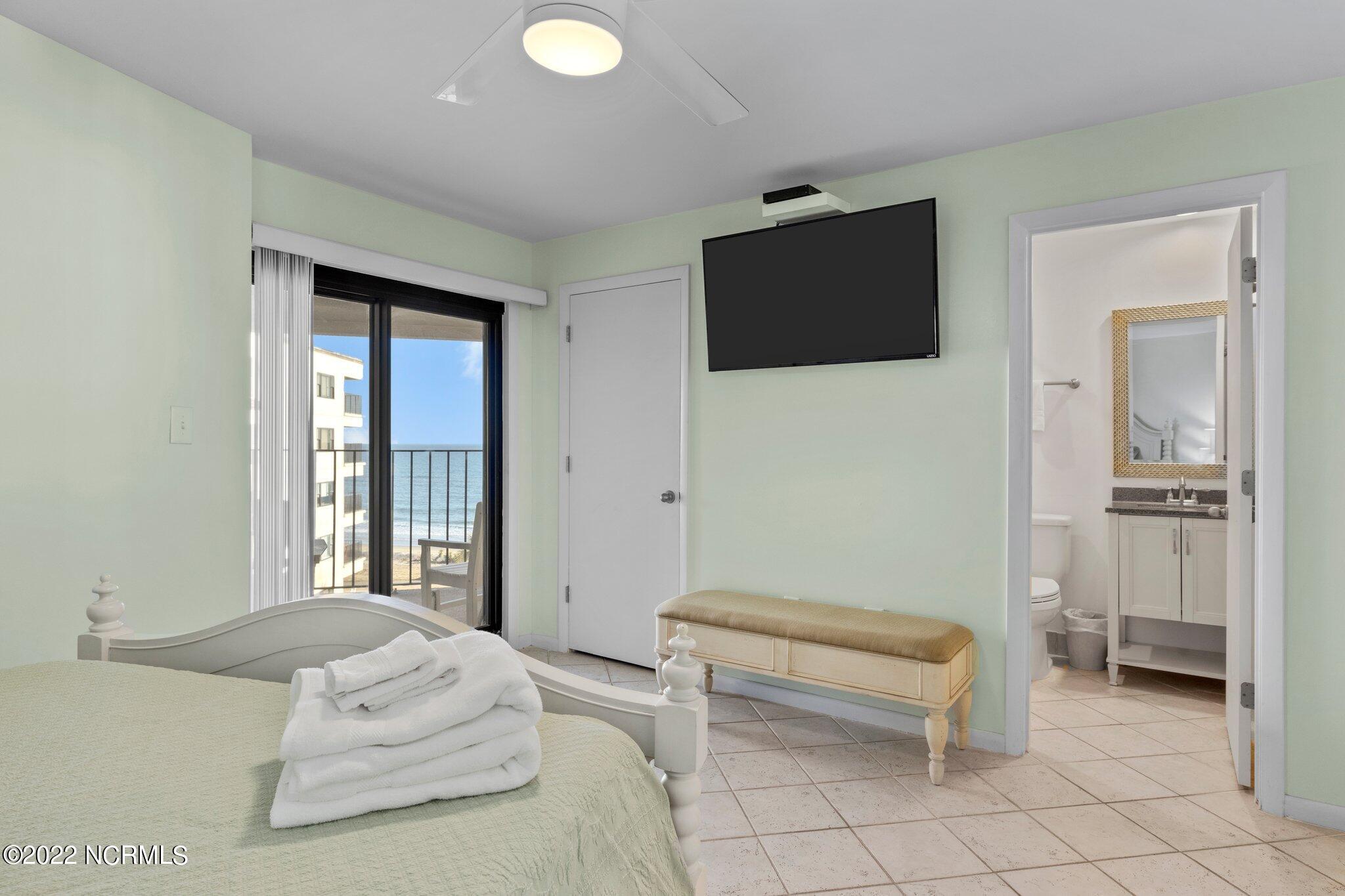 1505 Salter Path Road, Unit 425 Indian Beach, NC 28512 - Photo 15 of 35 Master Bedroom With Access To Covered De