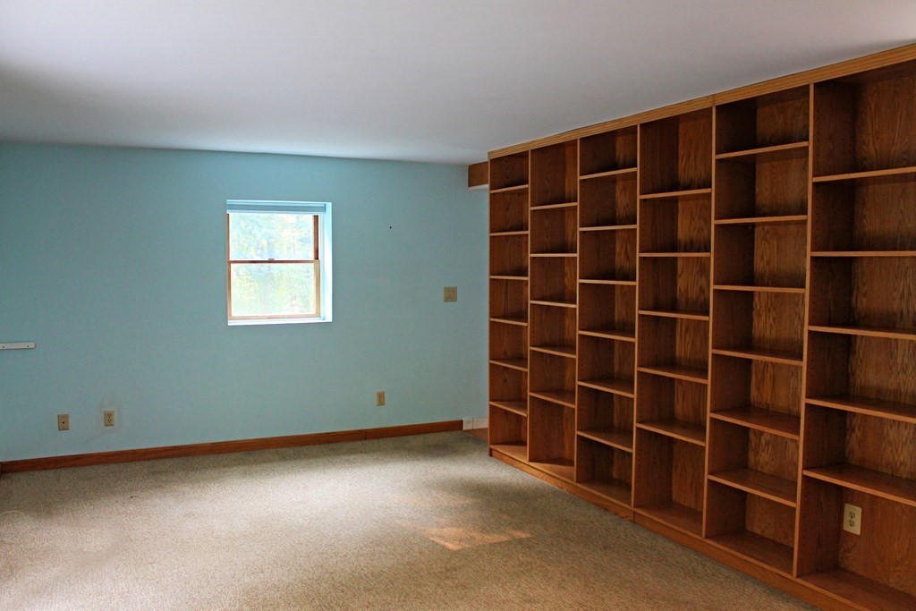 88 Groton Road Shirley, MA 01464 - Photo 5 of 30 a view of an empty room with a window