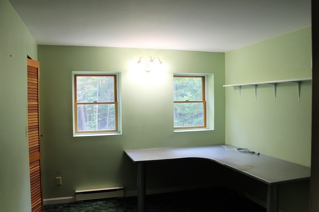 88 Groton Road Shirley, MA 01464 - Photo 10 of 30 a desk in a room with a window