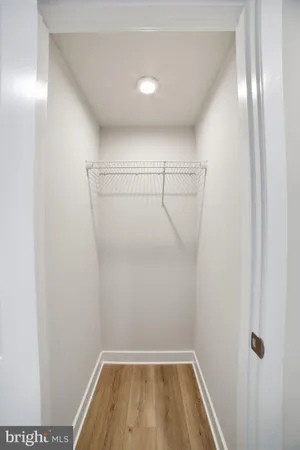 a view of a room with racks on the wall