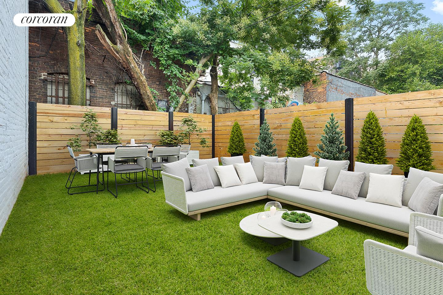 26 Goodwin Place, Unit 2R Brooklyn, NY 11221 - Photo 4 of 6 a view of a patio with couches and a table and chairs with garden view