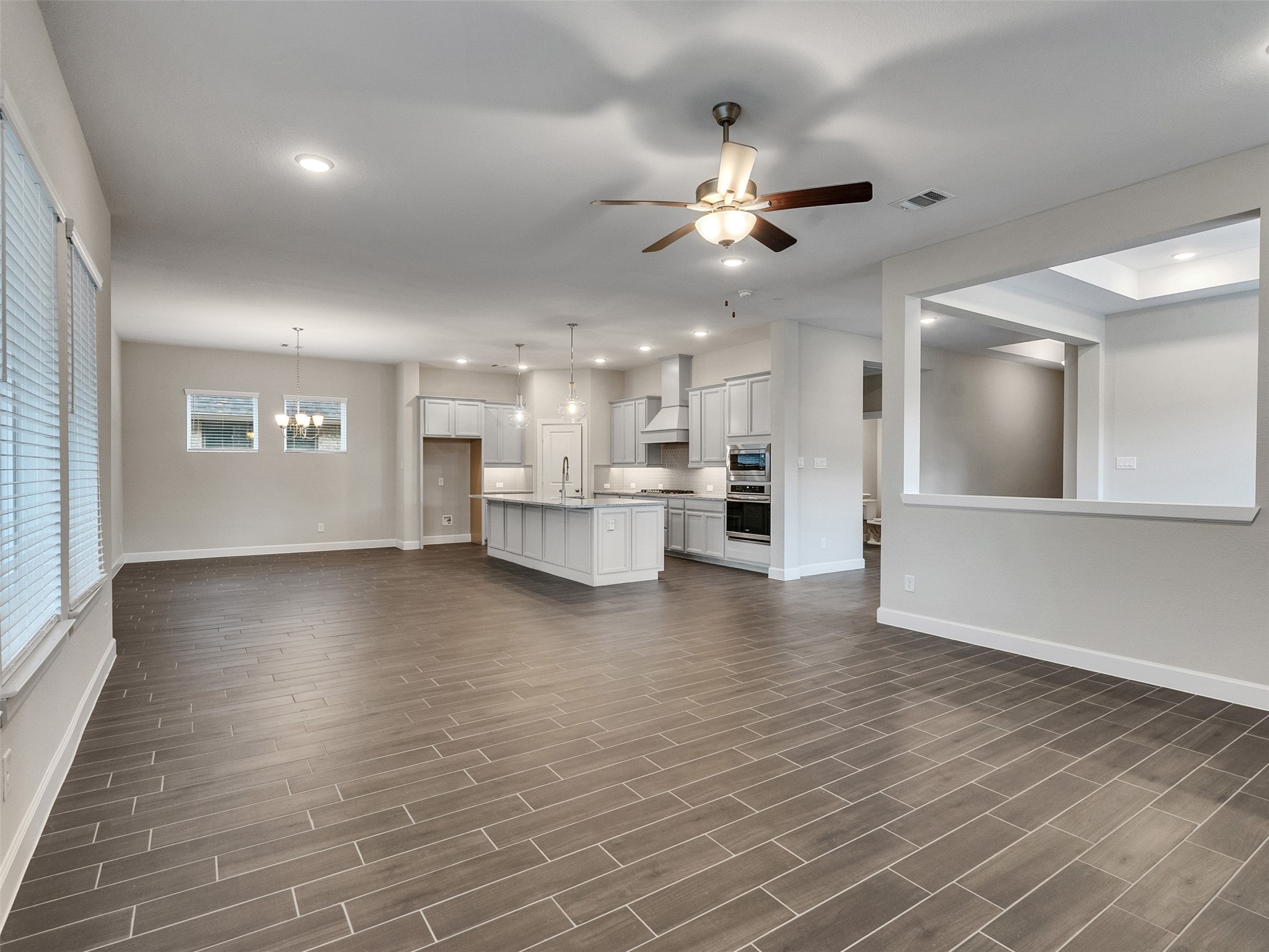 7003 Goldstrum Way Katy, TX 77493 - Photo 12 of 44 a view of a kitchen with a sink and a window