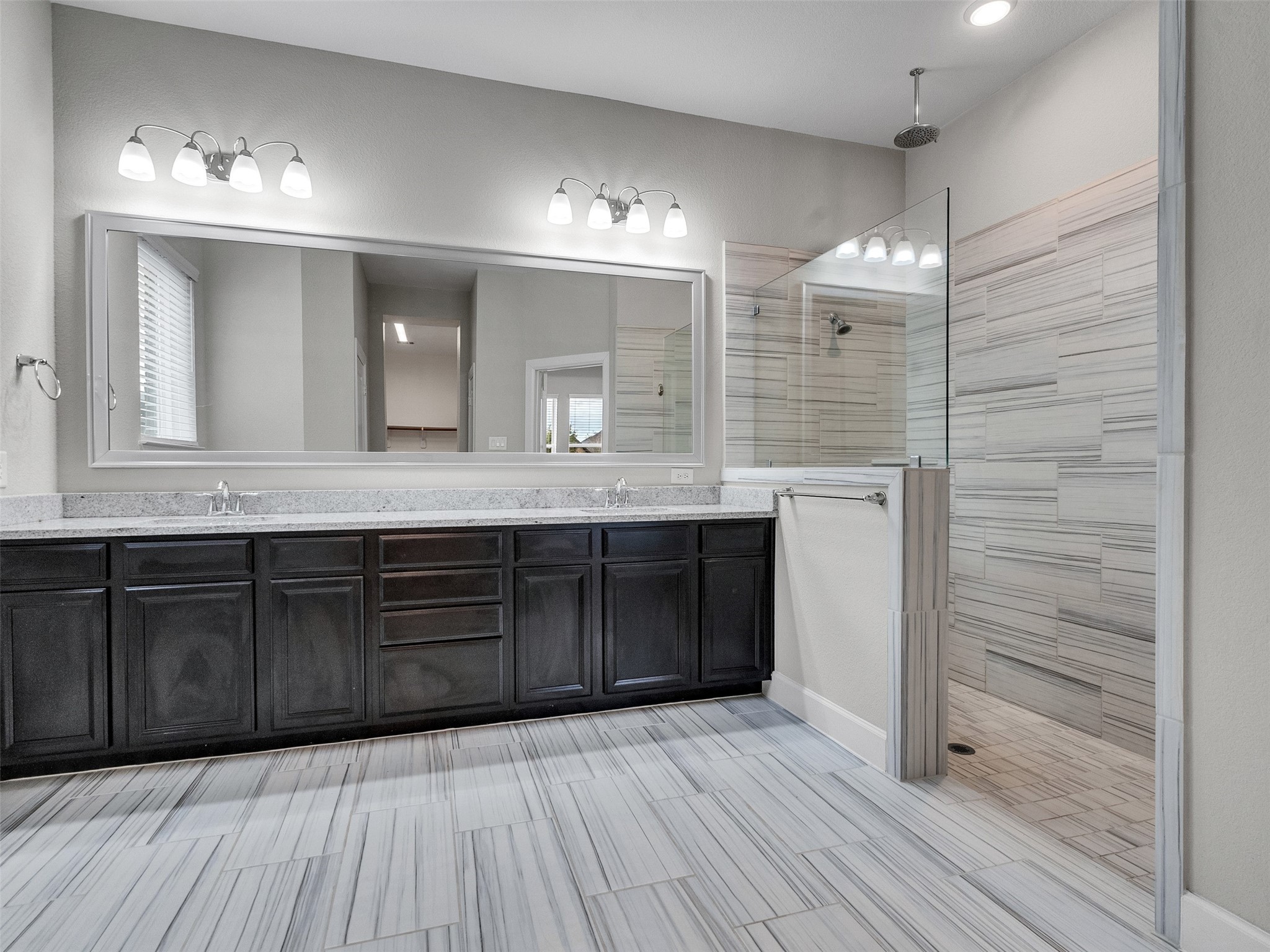 7003 Goldstrum Way Katy, TX 77493 - Photo 22 of 44 a bathroom with a granite countertop sink vanity and a mirror