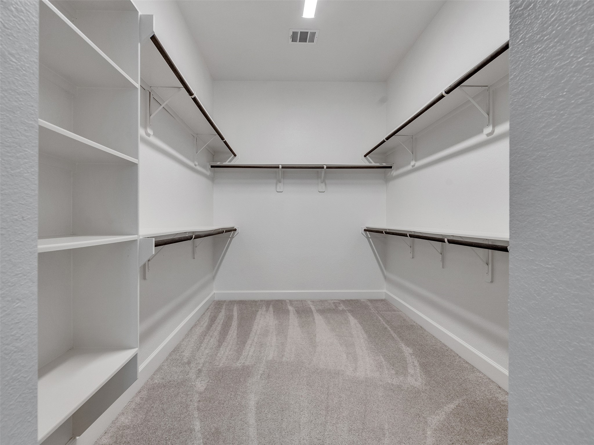 7003 Goldstrum Way Katy, TX 77493 - Photo 23 of 44 a view of an empty walk in closet