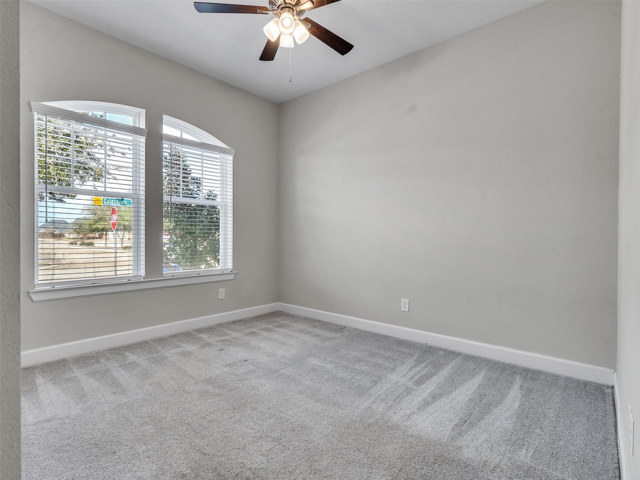 7003 Goldstrum Way Katy, TX 77493 - Photo 24 of 44 an empty room with a window