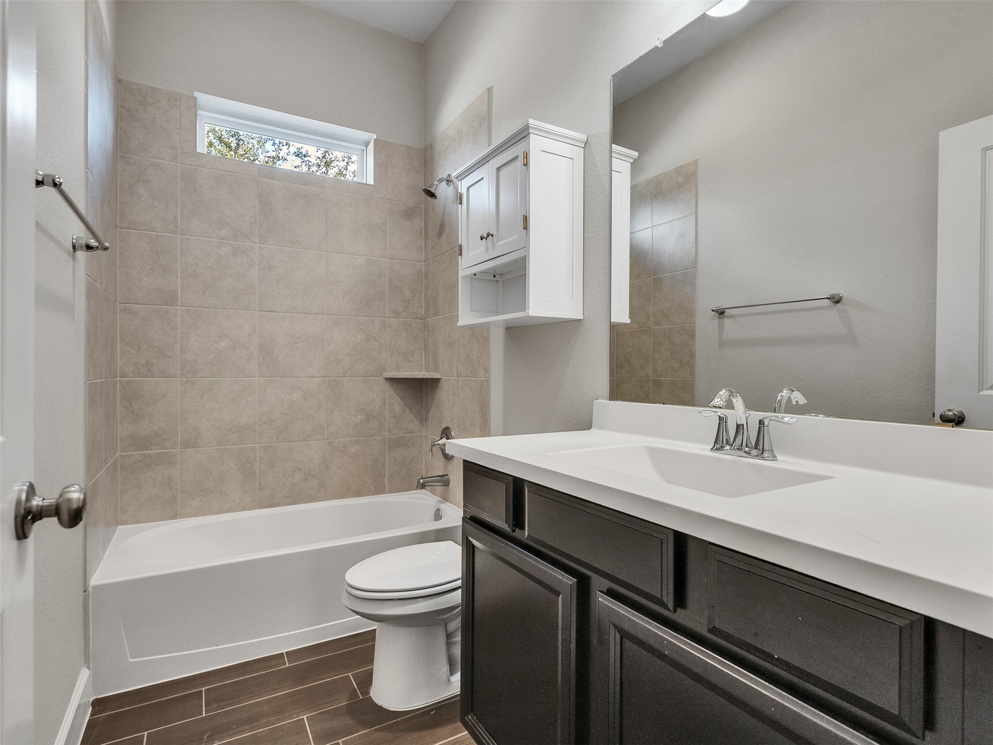 7003 Goldstrum Way Katy, TX 77493 - Photo 26 of 44 a bathroom with a sink a toilet and a bathtub
