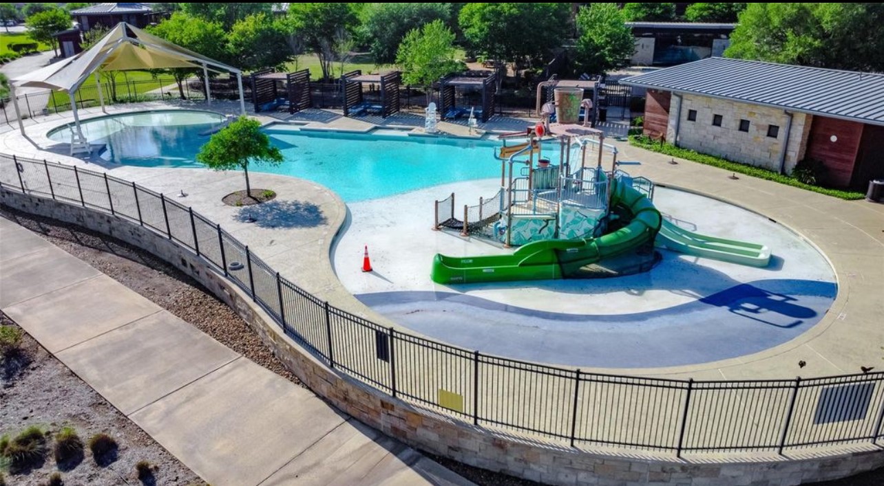 7003 Goldstrum Way Katy, TX 77493 - Photo 39 of 44 a view of swimming pool with outdoor seating