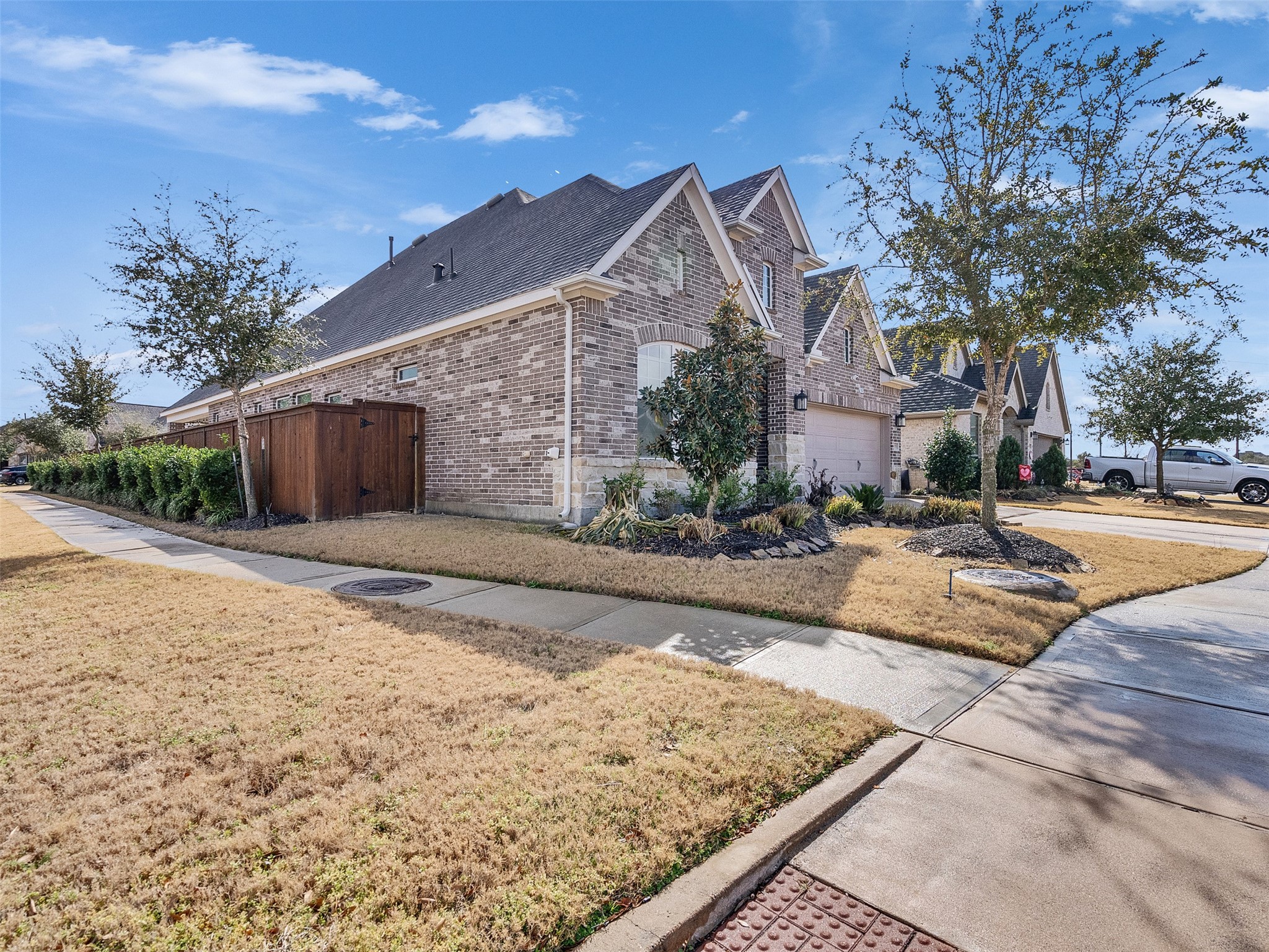 7003 Goldstrum Way Katy, TX 77493 - Photo 4 of 44 a view of a house with snow on the road
