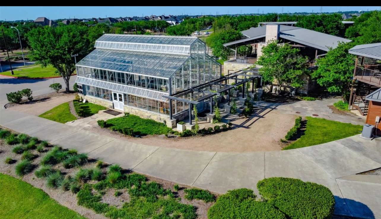 7003 Goldstrum Way Katy, TX 77493 - Photo 43 of 44 a view of a house with a yard and potted plants