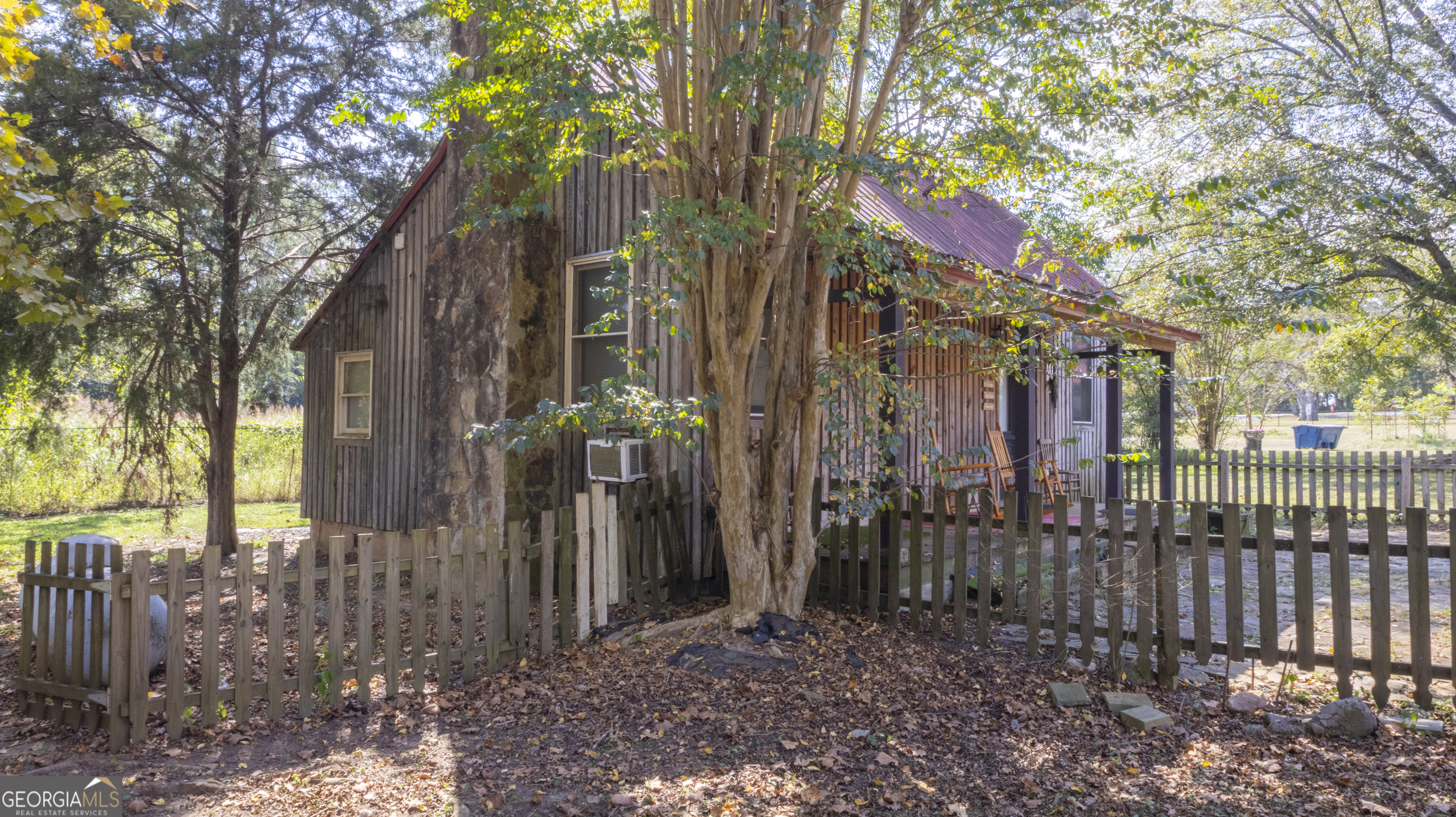 0 Ga Highway Molena, GA 30258 - Photo 16 of 27 a view of a house with a tree in the background