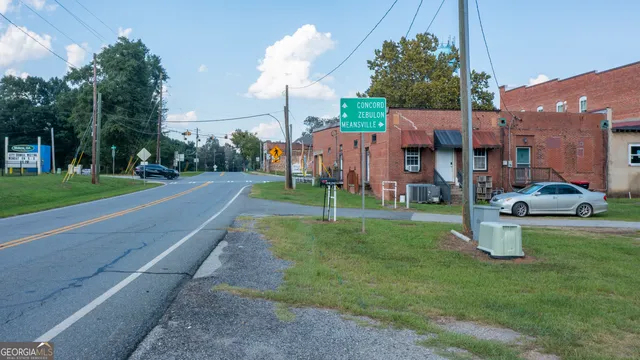 a car parked in front of a house