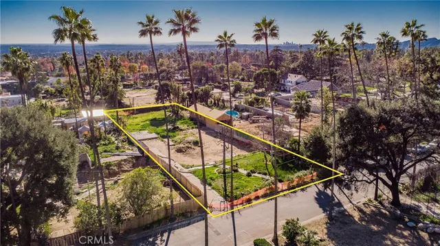a view of a swimming pool with chairs