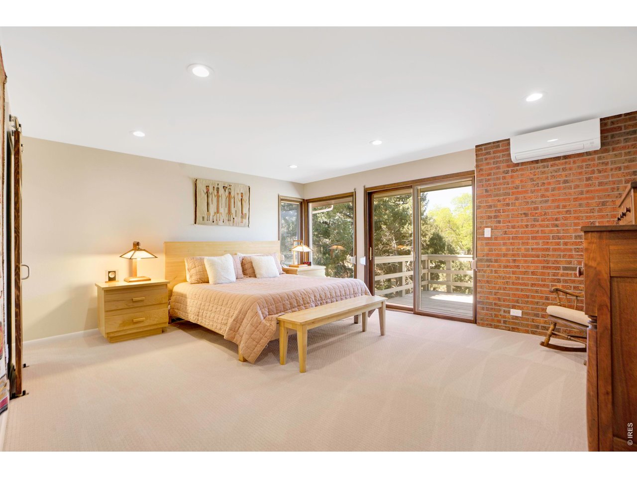 19 Ridge Road Boulder, CO 80303 - Photo 21 of 42 a spacious bedroom with a bed and a large window