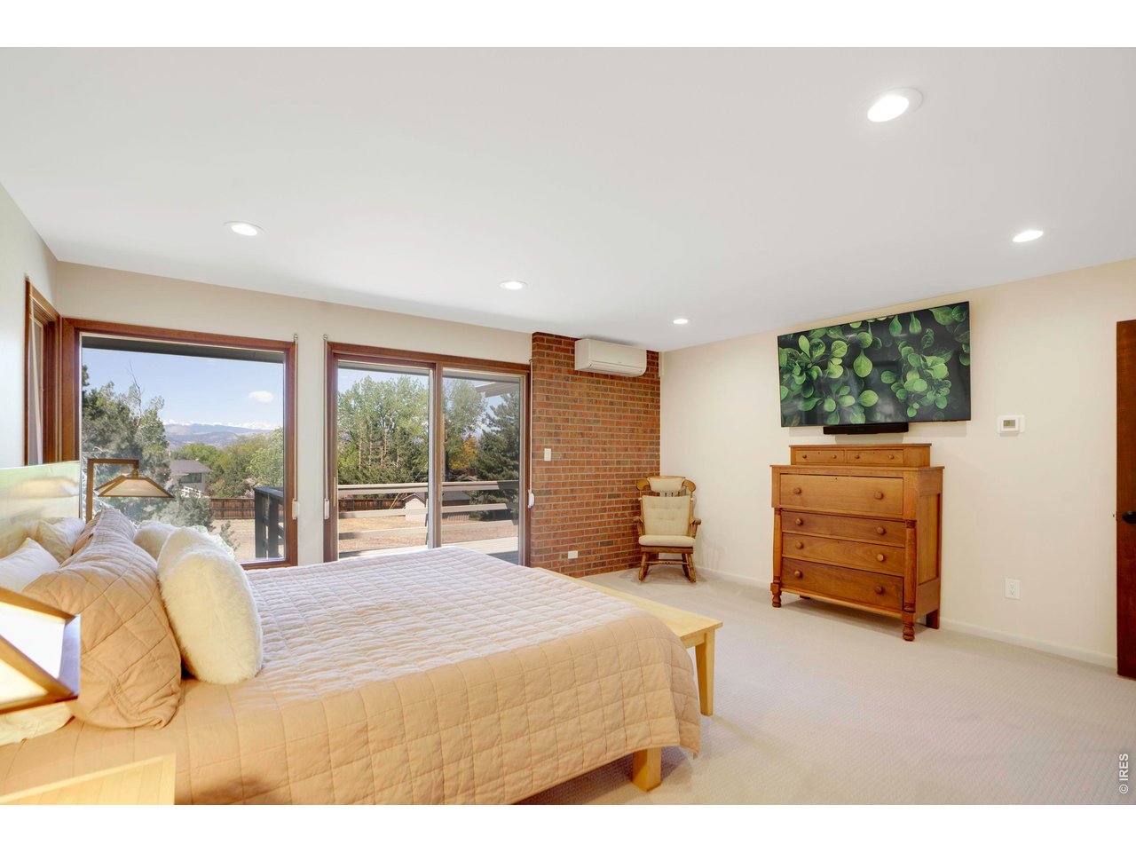 19 Ridge Road Boulder, CO 80303 - Photo 22 of 42 a bedroom with a bed and a large window