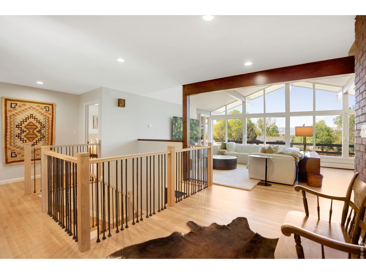 19 Ridge Road Boulder, CO 80303 - Photo 8 of 42 a dining room with furniture water view and large windows