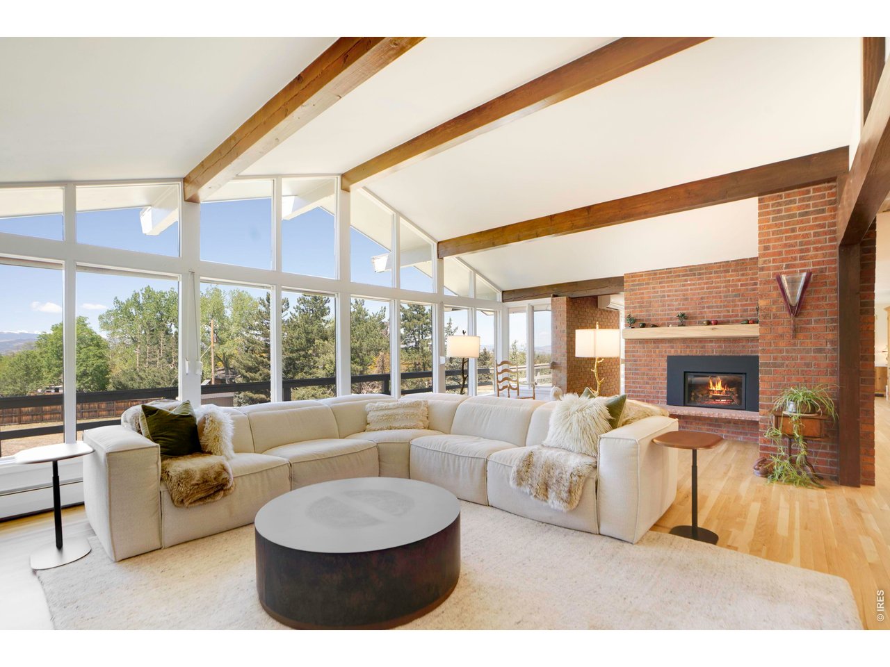 19 Ridge Road Boulder, CO 80303 - Photo 10 of 42 a living room with fireplace furniture and a large window