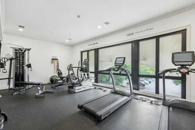 a view of a room with gym equipment
