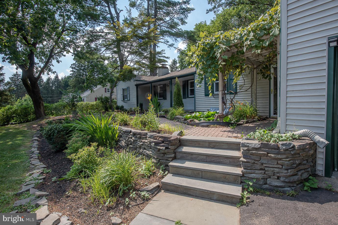 458 Edison Furlong Road Doylestown, PA 18901 - Photo 40 of 43 Walkway to Front Door and Koi Pond