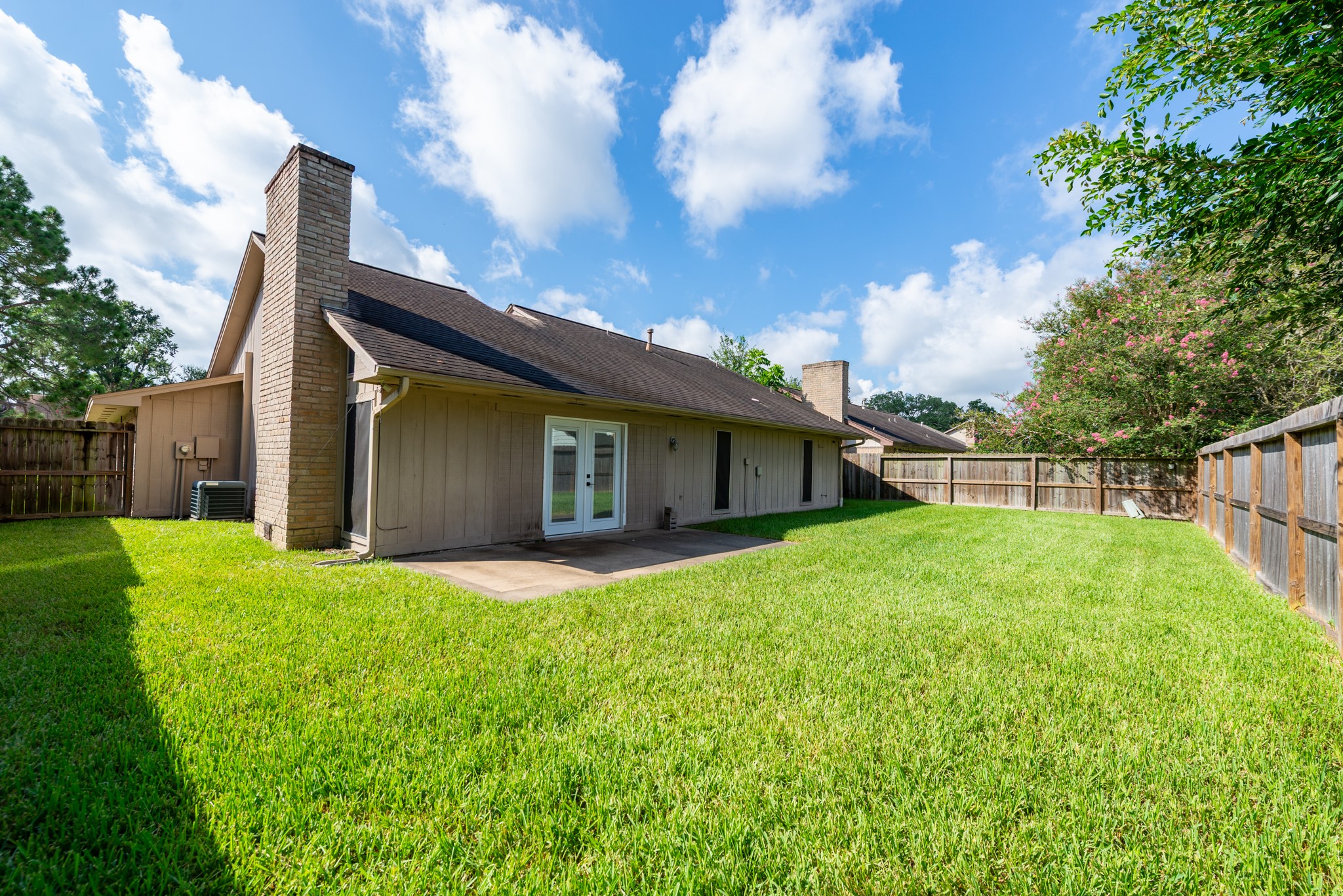 1022 White Sands Road Katy, TX 77450 - Photo 27 of 27 Large back yard with concrete patio.