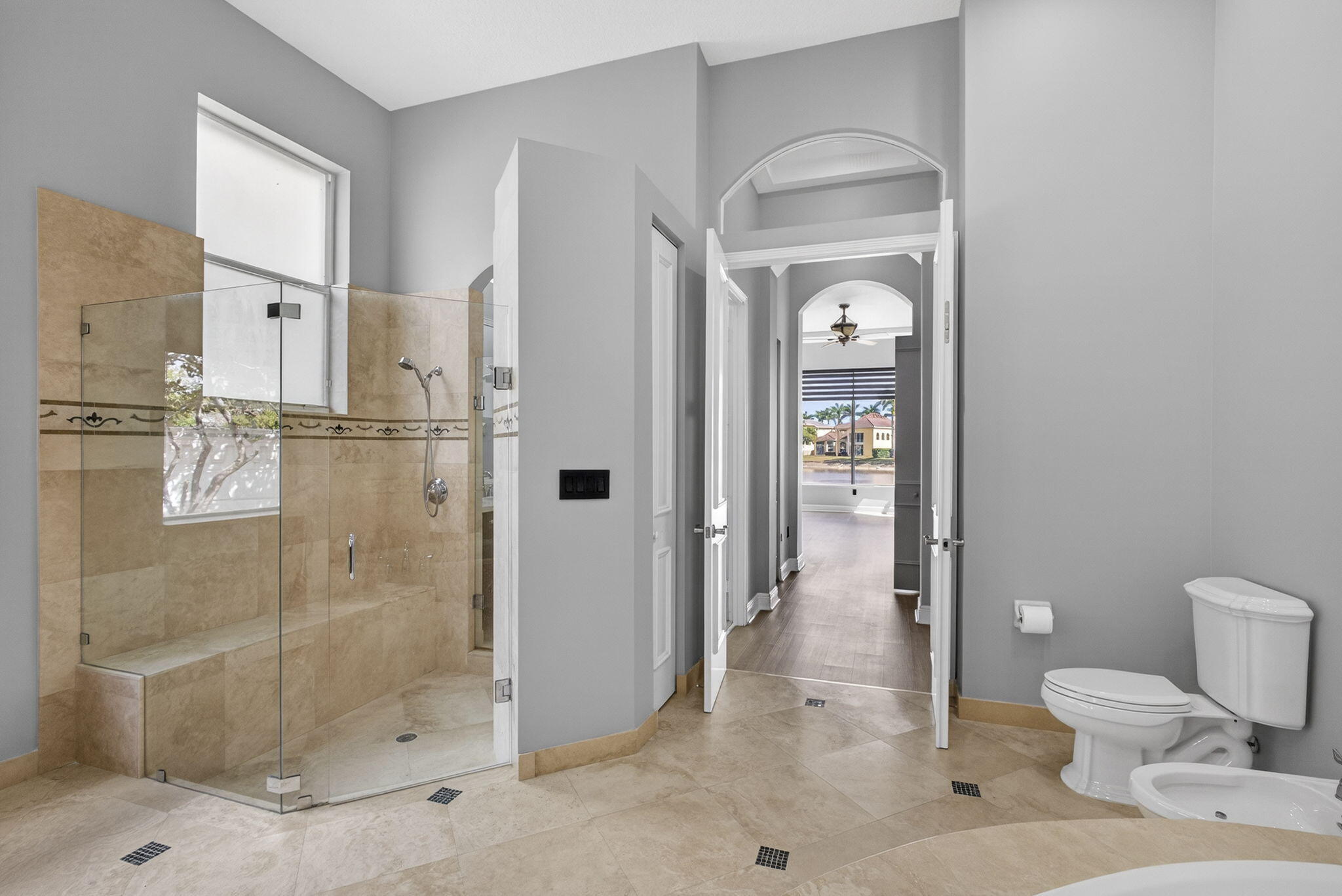 2162 Stotesbury Way Wellington, FL 33414 - Photo 18 of 41 a bathroom with a toilet sink and shower