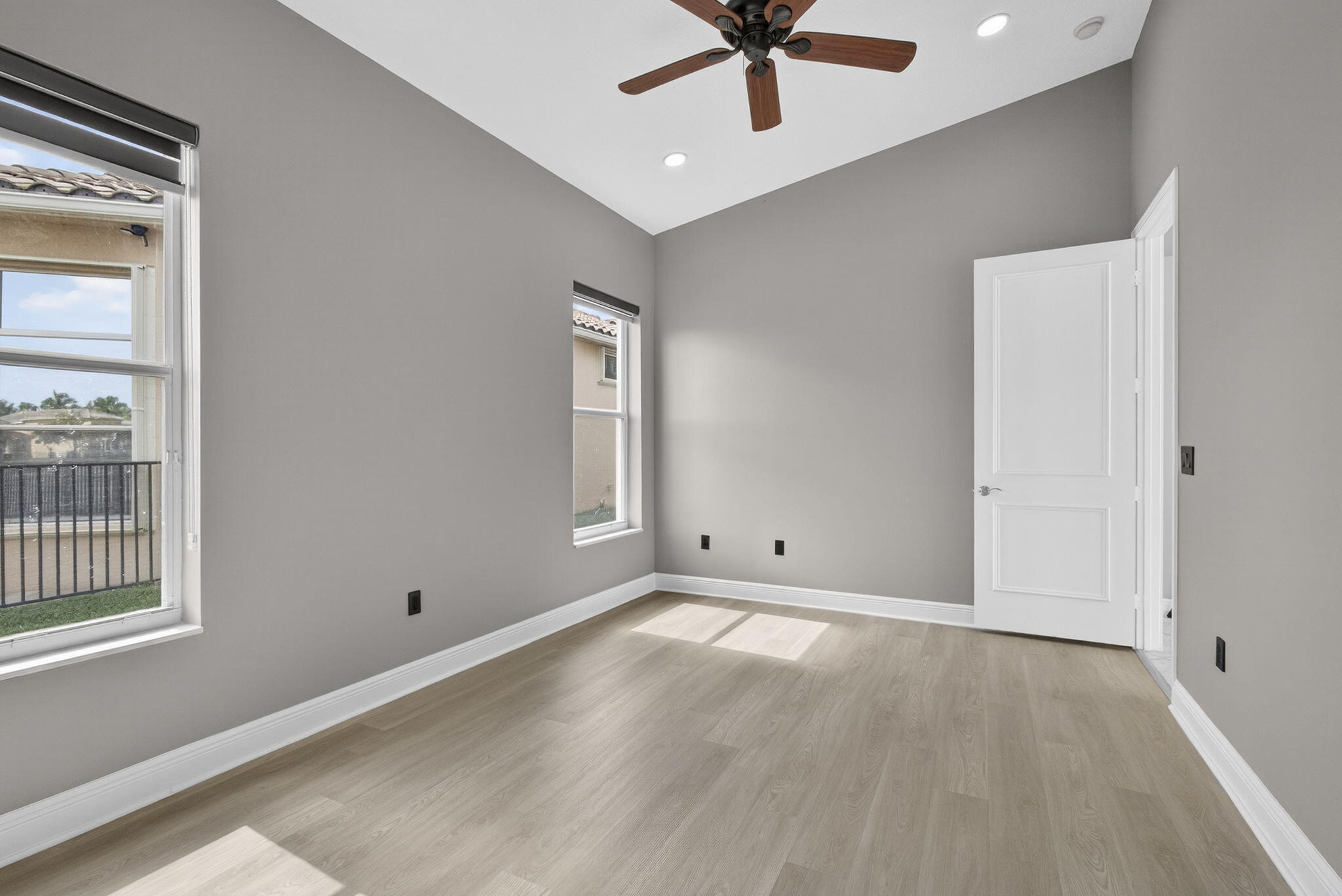 2162 Stotesbury Way Wellington, FL 33414 - Photo 21 of 41 wooden floor in an empty room with a window
