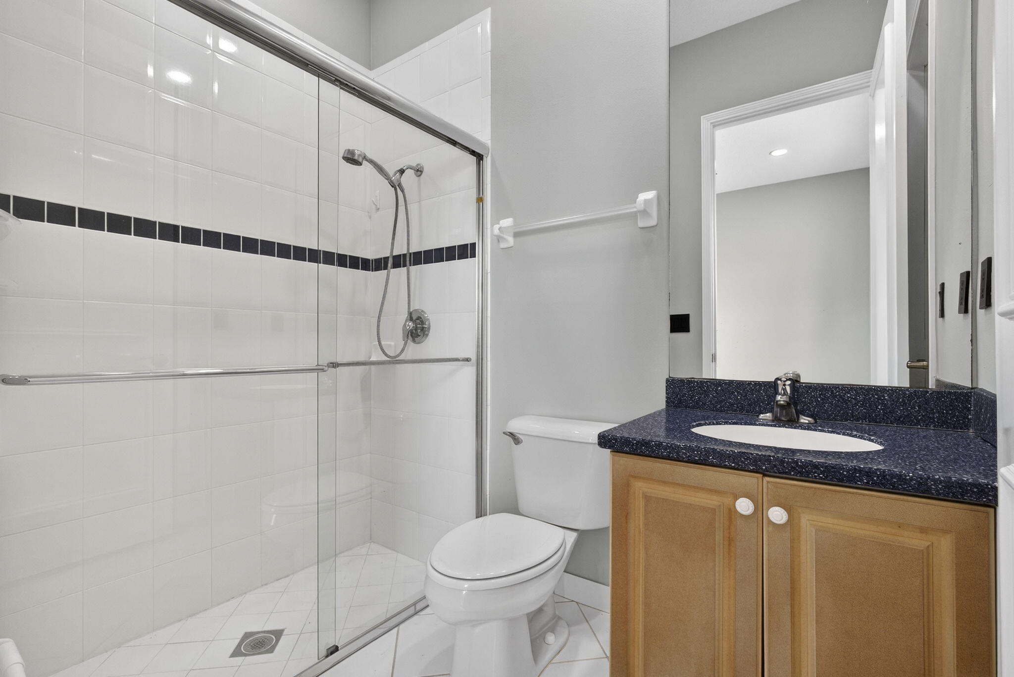 2162 Stotesbury Way Wellington, FL 33414 - Photo 22 of 41 a bathroom with a granite countertop sink toilet and shower