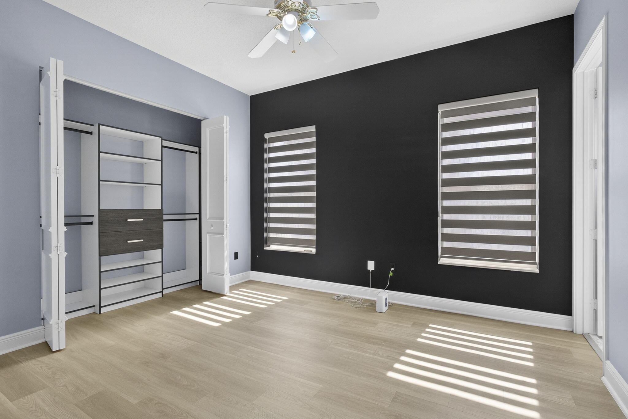 2162 Stotesbury Way Wellington, FL 33414 - Photo 25 of 41 a view of a livingroom with a hall and a window