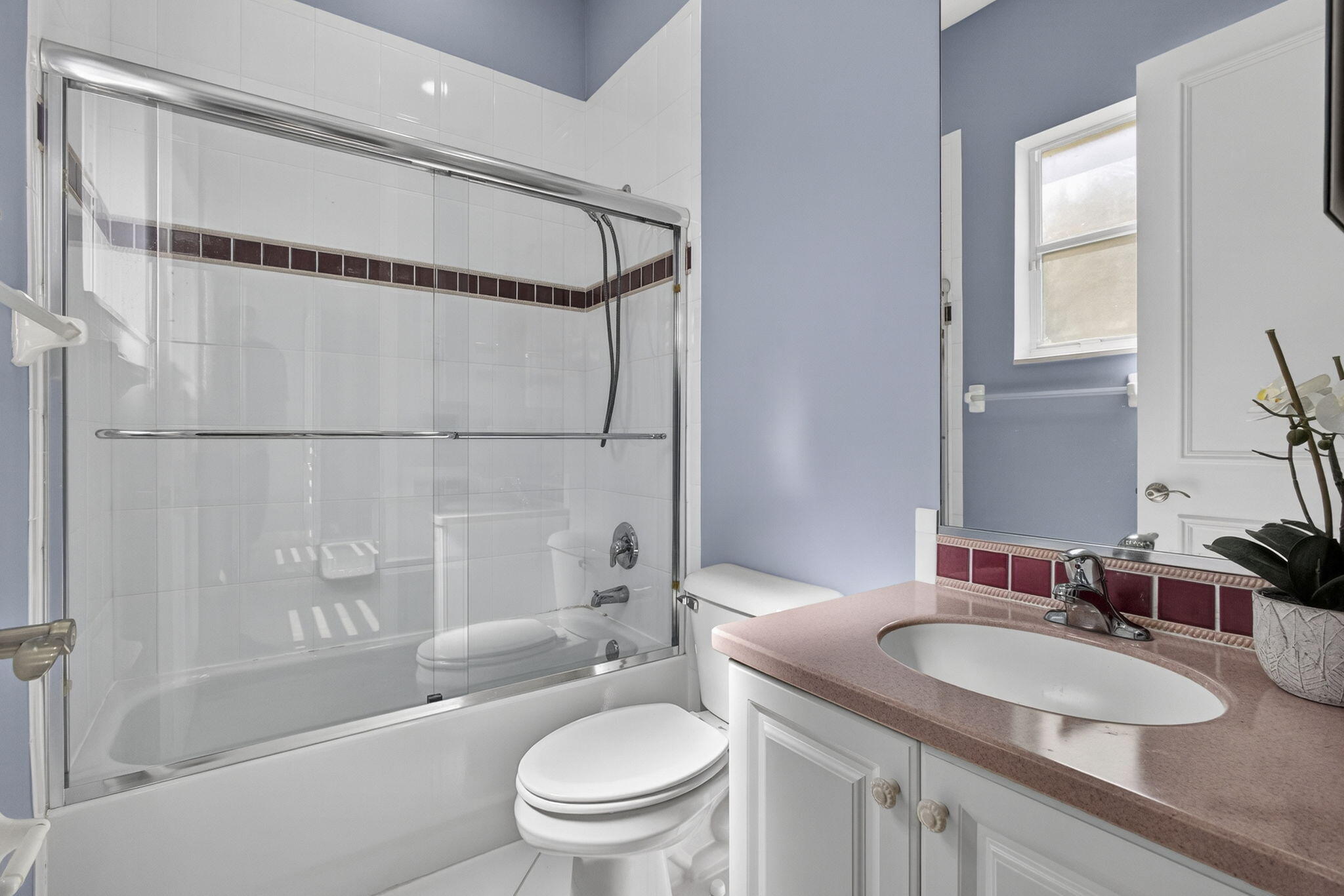 2162 Stotesbury Way Wellington, FL 33414 - Photo 26 of 41 a bathroom with a granite countertop sink toilet mirror and shower