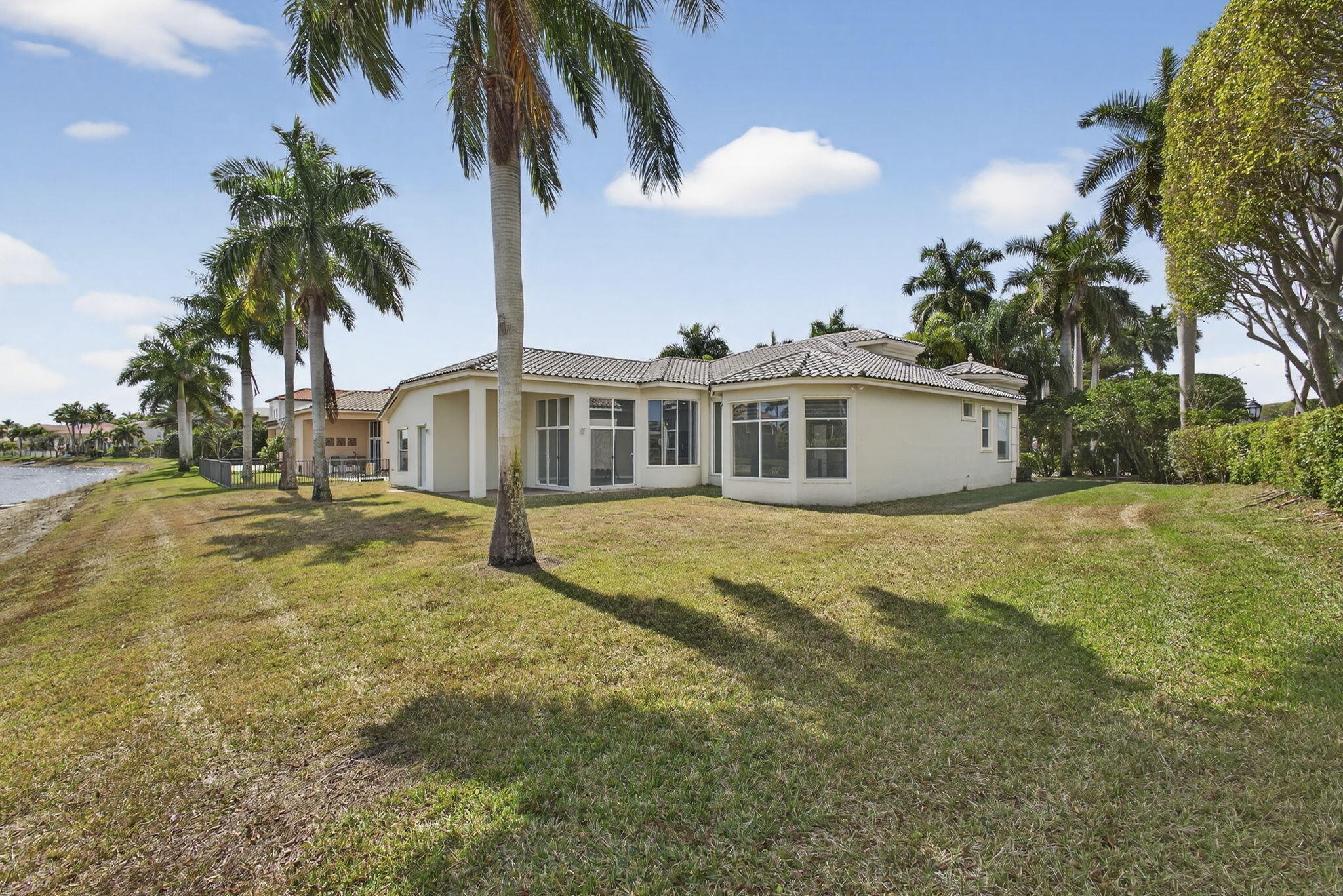 2162 Stotesbury Way Wellington, FL 33414 - Photo 32 of 41 a front view of a house with a garden
