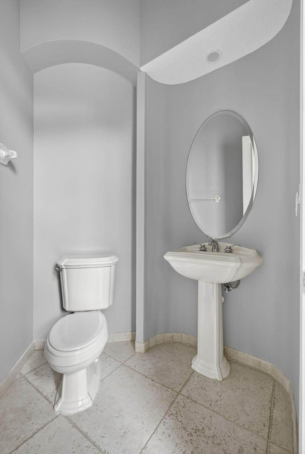 2162 Stotesbury Way Wellington, FL 33414 - Photo 7 of 41 a bathroom with a toilet sink and mirror