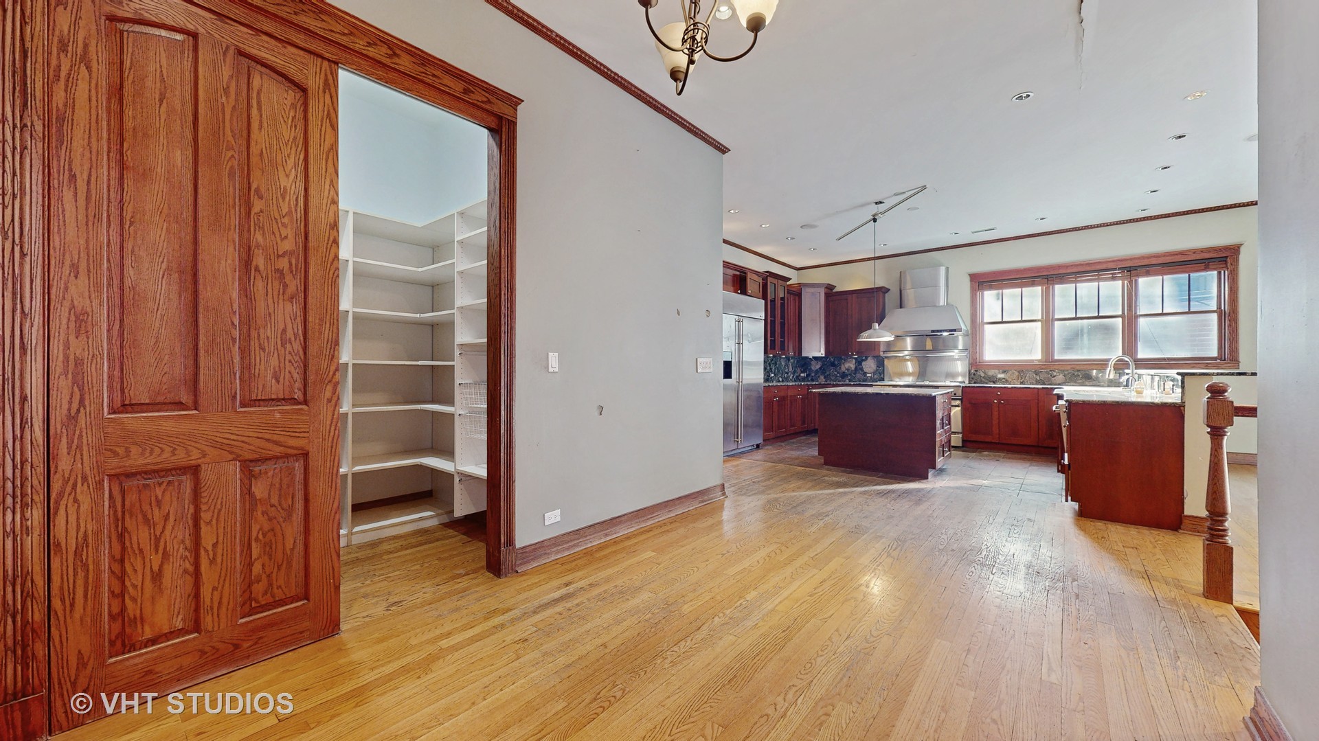3814 North Janssen Avenue Chicago, IL 60613 - Photo 12 of 56 a living room with furniture window and wooden floor